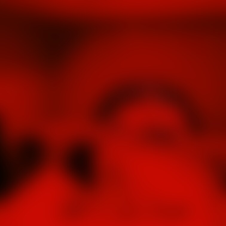 赤い光に照らされながら一生懸命ポージングをとっています笑