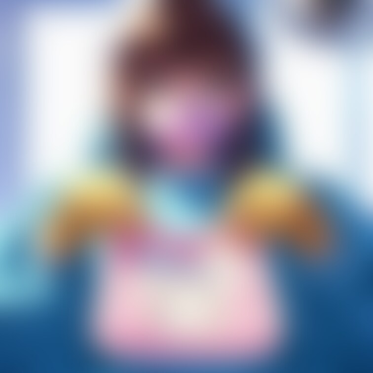 よだれ掛けを手に持つ歯科医師