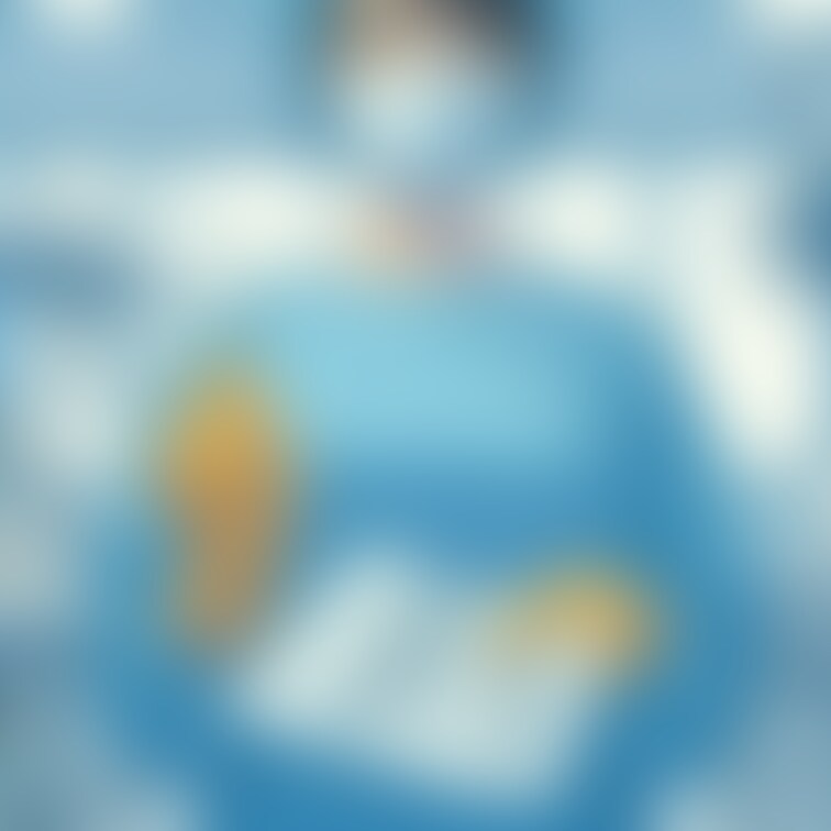 滅菌ガウンを着た歯科女医