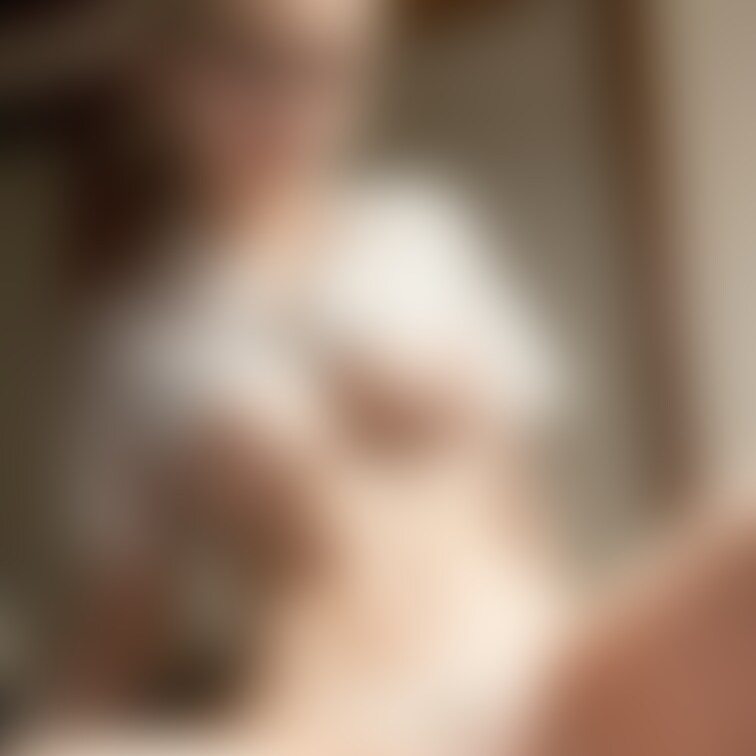 A girl in glasses covered in cum after getting cum inside of