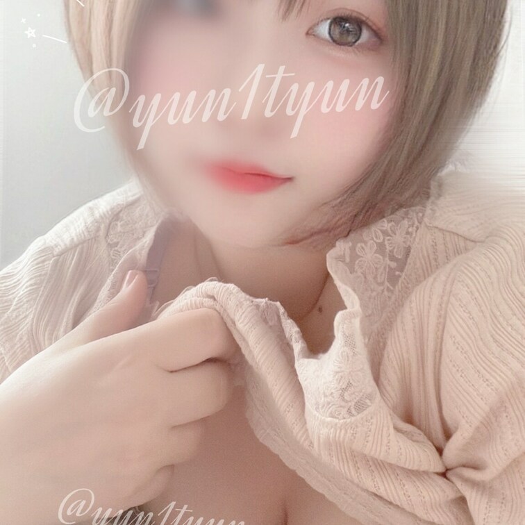 ニコッ